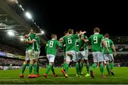 24 March 2019; Northern Ireland players celebrate their side's second goal scored by Josh Magennis during the UEFA EURO2020 Qualifier Group C match between Northern Ireland and Belarus at the National Football Stadium in Windsor Park, Belfast. Photo by Ramsey Cardy/Sportsfile