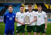 25 March 2019; UCC and Colleges & Universities players, from left, David Coffey, Pierce Phillips, Rob Slevin and Simon Falvey during the match between Colleges & Universities and Defence Forces at  Athlone Town Stadium in Athlone, Co. Westmeath. Photo by Harry Murphy/Sportsfile