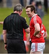 30 March 2019; Bevan Duffy of Louth with Referee Sean Laverty during the Allianz Football League Roinn 3 Round 6 match between Louth and Westmeath at the Gaelic Grounds in Drogheda, Louth.   Photo by Oliver McVeigh/Sportsfile