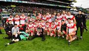 30 March 2019; The Derry players and officials celebrate after the Allianz Football League Division 4 Final between Derry and Leitrim at Croke Park in Dublin. Photo by Ray McManus/Sportsfile