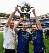 31 March 2019; Mayo goalkeeper Rob Hennelly celebrates with team-mates Keith Higgins and Chris Barrett, right, and the cup after the Allianz Football League Division 1 Final match between Kerry and Mayo at Croke Park in Dublin. Photo by Ray McManus/Sportsfile