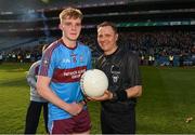 6 April 2019; Referee Rory Hickey presents the match ball to the captain of  St Michaels College Brandon Horan after the Masita GAA Post Primary Schools Hogan Cup Senior A Football match between Naas CBS and St Michaels College Enniskillen at Croke Park in Dublin. Photo by Ray McManus/Sportsfile