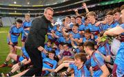 6 April 2019; The  St Michaels College players and the school principal Mark Henry celebrate with the Hogan cup after the Masita GAA Post Primary Schools Hogan Cup Senior A Football match between Naas CBS and St Michaels College Enniskillen at Croke Park in Dublin. Photo by Ray McManus/Sportsfile