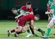 12 April 2019; Marco Zanon of Benetton Treviso is tackled by Billy Holland and Rhys Marshall of Munster during the Guinness PRO14 Round 20 game between Benetton Treviso and Munster Rugby at Stadio di Monigo in Treviso, Italy. Photo by Roberto Bregani/Sportsfile