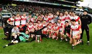 30 March 2019; The Derry squad celebrate with the cup after the Allianz Football League Division 4 Final between Derry and Leitrim at Croke Park in Dublin. Photo by Ray McManus/Sportsfile