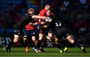 20 April 2019; Chris Farrell of Munster is tackled by Jackson Wray and Brad Barritt of Saracens during the Heineken Champions Cup Semi-Final match between Saracens and Munster at the Ricoh Arena in Coventry, England. Photo by Brendan Moran/Sportsfile