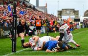 27 April 2019; Fergus McFadden of Leinster scores his side's second try despite the tackle of Darren Cave, left, and Michael Lowry of Ulster during the Guinness PRO14 Round 21 match between Ulster and Leinster at the Kingspan Stadium in Belfast. Photo by Ramsey Cardy/Sportsfile