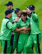 3 May 2019; Josh Little of Ireland, centre, celebrates with team mates after taking the wicket of Eoin Morgan during the One Day International between Ireland and England at Malahide Cricket Ground in Dublin. Photo by Sam Barnes/Sportsfile