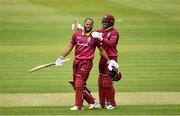 5 May 2019; John Campbell of West Indies, left,  celebrates with Shai Hope after scoring a century during the One Day International between Ireland and West Indies at Clontarf Cricket Club in Clontarf, Dublin. Photo by Sam Barnes/Sportsfile