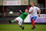 8 May 2019; Derek Walsh of Irish Defence Forces in action against Michael Cushion of United Kingdom Armed Forces during the match between Irish Defence Forces and United Kingdom Armed Forces at Richmond Park in Dublin. Photo by Stephen McCarthy/Sportsfile