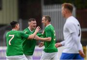 8 May 2019; Dave O'Riordan, right, is congratulated by his Irish Defence Forces team-mates Ben O'Donoghue, left, and Adrian Rafferty after scoring his side's first goal during the match between Irish Defence Forces and United Kingdom Armed Forces at Richmond Park in Dublin. Photo by Stephen McCarthy/Sportsfile