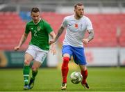 8 May 2019; Michael Campbell of United Kingdom Armed Forces in action against Aidan Friel of Irish Defence Forces during the match between Irish Defence Forces and United Kingdom Armed Forces at Richmond Park in Dublin. Photo by Stephen McCarthy/Sportsfile