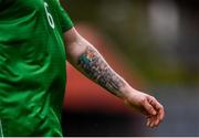 8 May 2019; A detailed view of a tattoo on the arm of Chris Kenny of Irish Defence Forces during the match between Irish Defence Forces and United Kingdom Armed Forces at Richmond Park in Dublin. Photo by Stephen McCarthy/Sportsfile