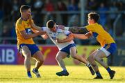 11 May 2019; Jack Mullaney of Waterford in action against Eoin Cleary, left, and Aaron Fitzgerald of Clare during the Munster GAA Football Senior Championship quarter-final match between Clare v Waterford at Cusack Park in Ennis, Clare. Photo by Sam Barnes/Sportsfile