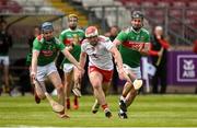12 May 2019; Matthew Mulgrew of Tyrone in action against San Mulroy and Cathal Freeman of Mayo during the Nicky Rackard Cup Group 2 Round 1 match between Tyrone and Mayo at Healy Park, Omagh in Tyrone. Photo by Oliver McVeigh/Sportsfile