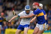 19 May 2019; Cian Rellis of Waterford in action against Conor Ryan of Tipperary during the Electric Ireland Munster Minor Hurling Championship match between Tipperary and Waterford at Semple Stadium, Thurles in Tipperary. Photo by Ray McManus/Sportsfile