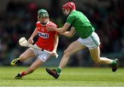 19 May 2019; Jack Cahalane of Cork in action against Michael Keane of Limerick during the Electric Ireland Munster Minor Hurling Championship match between Limerick and Cork at the LIT Gaelic Grounds in Limerick. Photo by Piaras Ó Mídheach/Sportsfile