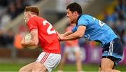 25 May 2019; Ryan Burns of Louth is tackled by Rory O'Carroll of Dublin during the Leinster GAA Football Senior Championship Quarter-Final match between Louth and Dublin at O’Moore Park in Portlaoise, Laois. Photo by Ray McManus/Sportsfile