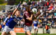 26 May 2019; Kevin Maguire of Westmeath  in action against Evan O'Carroll of Laois  during the GAA Football Senior Championship Quarter-Final match between Westmeath and Laois at Bord na Mona O’Connor Park in Tullamore, Offaly. Photo by Ray McManus/Sportsfile