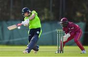 5 May 2019; Kim Garth of Ireland hits a boundary during the T20 International between Ireland and West Indies at the YMCA Cricket Ground, Ballsbridge, Dublin.  Photo by Brendan Moran/Sportsfile