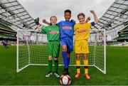 29 May 2019; The SPAR FAI Primary School 5s National Finals took place in AVIVA Stadium on Wednesday, May 29, where former Republic of Ireland International Keith Andrews and current Republic of Ireland women's footballer, Megan Campbell were in attendance supporting as girls and boys from 13 counties battled it out for national honours. The 2019 SPAR FAI Primary School 5s Programme was the biggest yet with a record 37,448 participants from 1,696 schools taking part in county, regional and provincial blitzes nationwide. Pictured are, from left, Ellie Browne, aged 13, from Galway, Declan Osagie, aged 13, from Offaly,  and Jodie Loughrey, aged 12, from Donegal, at the Aviva Stadium in Dublin.   Photo by Sam Barnes/Sportsfile