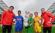 29 May 2019; The SPAR FAI Primary School 5s National Finals took place in AVIVA Stadium on Wednesday, May 29, where former Republic of Ireland International Keith Andrews and current Republic of Ireland women's footballer, Megan Campbell were in attendance supporting as girls and boys from 13 counties battled it out for national honours. The 2019 SPAR FAI Primary School 5s Programme was the biggest yet with a record 37,448 participants from 1,696 schools taking part in county, regional and provincial blitzes nationwide. Pictured are, from left, former Republic of Ireland International Keith Andrews, Declan Osagie, aged 13, from Offaly, Ellie Browne, aged 13, from Galway,  Jodie Loughrey, aged 12, from Donegal, and Republic of Ireland International Megan Campbell at the Aviva Stadium in Dublin.   Photo by Sam Barnes/Sportsfile