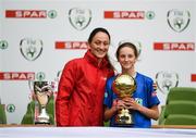 29 May 2019; The SPAR FAI Primary School 5s National Finals took place in AVIVA Stadium on Wednesday, May 29, where former Republic of Ireland International Keith Andrews and current Republic of Ireland women's footballer, Megan Campbell were in attendance supporting as girls and boys from 13 counties battled it out for national honours. The 2019 SPAR FAI Primary School 5s Programme was the biggest yet with a record 37,448 participants from 1,696 schools taking part in county, regional and provincial blitzes nationwide. Pictured is Ellen Dolan of Mucklagh NS, Co. Offaly, being presented their Player Of The Tournament award by Republic of Ireland women's footballer Megan Campbell at the Aviva Stadium in Dublin. Photo by Harry Murphy/Sportsfile