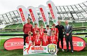 29 May 2019; The SPAR FAI Primary School 5s National Finals took place in AVIVA Stadium on Wednesday, May 29, where former Republic of Ireland International Keith Andrews and current Republic of Ireland women's footballer, Megan Campbell were in attendance supporting as girls and boys from 13 counties battled it out for national honours. The 2019 SPAR FAI Primary School 5s Programme was the biggest yet with a record 37,448 participants from 1,696 schools taking part in county, regional and provincial blitzes nationwide. Pictured is the Scoil Phadraig Naofa team, from Rochestown, Co. Cork, with  Mark Cantillon, Spar, right, at the Aviva Stadium in Dublin.   Photo by Sam Barnes/Sportsfile