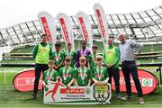 29 May 2019; The SPAR FAI Primary School 5s National Finals took place in AVIVA Stadium on Wednesday, May 29, where former Republic of Ireland International Keith Andrews and current Republic of Ireland women's footballer, Megan Campbell were in attendance supporting as girls and boys from 13 counties battled it out for national honours. The 2019 SPAR FAI Primary School 5s Programme was the biggest yet with a record 37,448 participants from 1,696 schools taking part in county, regional and provincial blitzes nationwide. Pictured is the Second St John The Apostle National School team, from Galway, with Tom Meehan, Spar Retailer, at the Aviva Stadium in Dublin.   Photo by Sam Barnes/Sportsfile