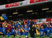 29 May 2019; The SPAR FAI Primary School 5s National Finals took place in AVIVA Stadium on Wednesday, May 29, where former Republic of Ireland International Keith Andrews and current Republic of Ireland women's footballer, Megan Campbell were in attendance supporting as girls and boys from 13 counties battled it out for national honours. The 2019 SPAR FAI Primary School 5s Programme was the biggest yet with a record 37,448 participants from 1,696 schools taking part in county, regional and provincial blitzes nationwide. Fans react at the Aviva Stadium in Dublin. Photo by Harry Murphy/Sportsfile