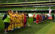 29 May 2019; The SPAR FAI Primary School 5s National Finals took place in AVIVA Stadium on Wednesday, May 29, where former Republic of Ireland International Keith Andrews and current Republic of Ireland women's footballer, Megan Campbell were in attendance supporting as girls and boys from 13 counties battled it out for national honours. The 2019 SPAR FAI Primary School 5s Programme was the biggest yet with a record 37,448 participants from 1,696 schools taking part in county, regional and provincial blitzes nationwide. Players line up at the Aviva Stadium in Dublin. Photo by Harry Murphy/Sportsfile