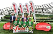 29 May 2019; The SPAR FAI Primary School 5s National Finals took place in AVIVA Stadium on Wednesday, May 29, where former Republic of Ireland International Keith Andrews and current Republic of Ireland women's footballer, Megan Campbell were in attendance supporting as girls and boys from 13 counties battled it out for national honours. The 2019 SPAR FAI Primary School 5s Programme was the biggest yet with a record 37,448 participants from 1,696 schools taking part in county, regional and provincial blitzes nationwide. Pictured are the Third Scoil Ide team, from Salthill, Co. Galway, with Mark Jones, Spar, right, at the Aviva Stadium in Dublin.   Photo by Sam Barnes/Sportsfile