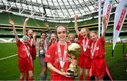 29 May 2019; The SPAR FAI Primary School 5s National Finals took place in AVIVA Stadium on Wednesday, May 29, where former Republic of Ireland International Keith Andrews and current Republic of Ireland women's footballer, Megan Campbell were in attendance supporting as girls and boys from 13 counties battled it out for national honours. The 2019 SPAR FAI Primary School 5s Programme was the biggest yet with a record 37,448 participants from 1,696 schools taking part in county, regional and provincial blitzes nationwide. Pictured is Grace Gleeson of Crusheen NS, Co. Clare with her player of the tournament award. Photo by David Fitzgerald/Sportsfile