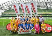 29 May 2019; The SPAR FAI Primary School 5s National Finals took place in AVIVA Stadium on Wednesday, May 29, where former Republic of Ireland International Keith Andrews and current Republic of Ireland women's footballer, Megan Campbell were in attendance supporting as girls and boys from 13 counties battled it out for national honours. The 2019 SPAR FAI Primary School 5s Programme was the biggest yet with a record 37,448 participants from 1,696 schools taking part in county, regional and provincial blitzes nationwide. Pictured are players and coaches from the winning girls team Mucklagh NS, Co Offaly and boys team St. Oran’s NS, Cockhill,  Co Donegal with Spar Representatives Carl and Colm McDaid. Photo by David Fitzgerald/Sportsfile