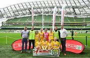29 May 2019; The SPAR FAI Primary School 5s National Finals took place in AVIVA Stadium on Wednesday, May 29, where former Republic of Ireland International Keith Andrews and current Republic of Ireland women's footballer, Megan Campbell were in attendance supporting as girls and boys from 13 counties battled it out for national honours. The 2019 SPAR FAI Primary School 5s Programme was the biggest yet with a record 37,448 participants from 1,696 schools taking part in county, regional and provincial blitzes nationwide. Pictured are players and coaches from Glenswilly NS, Co Donegal with Spar Representatives Carl and Colm McDaid. Photo by David Fitzgerald/Sportsfile