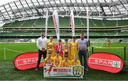 29 May 2019; The SPAR FAI Primary School 5s National Finals took place in AVIVA Stadium on Wednesday, May 29, where former Republic of Ireland International Keith Andrews and current Republic of Ireland women's footballer, Megan Campbell were in attendance supporting as girls and boys from 13 counties battled it out for national honours. The 2019 SPAR FAI Primary School 5s Programme was the biggest yet with a record 37,448 participants from 1,696 schools taking part in county, regional and provincial blitzes nationwide. Pictured are players and coaches from St. Oran’s NS, Cockhill, Donegal with Spar Representatives Carl and Colm McDaid. Photo by David Fitzgerald/Sportsfile