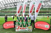 29 May 2019; The SPAR FAI Primary School 5s National Finals took place in AVIVA Stadium on Wednesday, May 29, where former Republic of Ireland International Keith Andrews and current Republic of Ireland women's footballer, Megan Campbell were in attendance supporting as girls and boys from 13 counties battled it out for national honours. The 2019 SPAR FAI Primary School 5s Programme was the biggest yet with a record 37,448 participants from 1,696 schools taking part in county, regional and provincial blitzes nationwide. Pictured are players and coaches from Cregmore NS, Claregalway, Co Galway with Spar Representative Tom Meehan. Photo by David Fitzgerald/Sportsfile