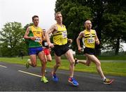 15 June 2019; Eamon White of North Belfast Harriers, centre, Mark Pearce of Brothers Pearse A.C., Co. Dublin, left, and Philip Goss of North Belfast Harriers, right, compete during the Irish Runner 5 Mile in conjunction with the AAI National 5 Mile Championships at the Phoenix Park in Dublin. Photo by Harry Murphy/Sportsfile