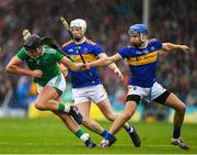 16 June 2019; Paddy O’Loughlin of Limerick in action against John McGrath and Michael Breen of Tipperary  during the Munster GAA Hurling Senior Championship Round 5 match between Tipperary and Limerick in Semple Stadium in Thurles, Tipperary. Photo by Ray McManus/Sportsfile
