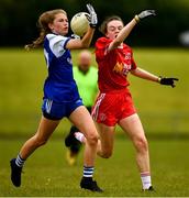22 June 2019; Shona McHugh of Monaghan in action against Emer McCanny of Tyrone during the Ladies Football All-Ireland U14 Gold Final 2019 match between Monaghan and Tyrone at St Aidan's GAA Club in Templeport, Cavan. Photo by Ray McManus/Sportsfile