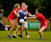 22 June 2019; / m14 in action against Roisin Colton, Cáoileánn Quinn and Emer McCanny of Tyrone during the Ladies Football All-Ireland U14 Gold Final 2019 match between Monaghan and Tyrone at St Aidan's GAA Club in Templeport, Cavan. Photo by Ray McManus/Sportsfile