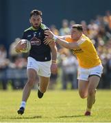 22 June 2019; Fergal Conway of Kildare in action against Declan Lynch of Antrim during the GAA Football All-Ireland Senior Championship Round 2 match between Antrim and Kildare at Corrigan Park in Belfast, Antrim. Photo by Ramsey Cardy/Sportsfile