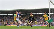 23 June 2019; Conor Rehill of Cavan misses a goal opportunity under pressure from Paddy McGrath, right, and Shaun Patton of Donegal during the Ulster GAA Football Senior Championship Final match between Donegal and Cavan at St Tiernach's Park in Clones, Monaghan. Photo by Sam Barnes/Sportsfile