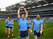 23 June 2019; Dublin's Brian Howard, with Michael Darragh Macauley alongside, with the Delaney Cup after the Leinster GAA Football Senior Championship Final match between Dublin and Meath at Croke Park in Dublin. Photo by Ray McManus/Sportsfile