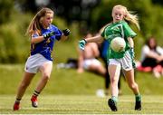 22 June 2019; Caoimhe Smith of Limerick and Niamh Hayes of Tipperary during the Ladies Football All-Ireland U14 Silver Final 2019 match between Limerick and Tipperary at St Rynaghs in Banagher, Offaly. Photo by Ben McShane/Sportsfile