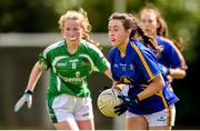 22 June 2019; Helen Cleere of Tipperary and Lucy O'Brien of Limerick during the Ladies Football All-Ireland U14 Silver Final 2019 match between Limerick and Tipperary at St Rynaghs in Banagher, Offaly. Photo by Ben McShane/Sportsfile