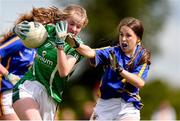 22 June 2019; Lucy O'Brien of Limerick in action against Emer Dwan of Tipperary during the Ladies Football All-Ireland U14 Silver Final 2019 match between Limerick and Tipperary at St Rynaghs in Banagher, Offaly. Photo by Ben McShane/Sportsfile