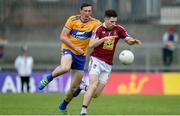 29 June 2019; James Dolan of Westmeath in action against Cathal O'Connor of Clare  during the GAA Football All-Ireland Senior Championship Round 3 match between Westmeath and Clare at TEG Cusack Park in Mullingar, Westmeath. Photo by Sam Barnes/Sportsfile