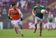 29 June 2019; Fionn McDonagh of Mayo in action against Aidan Forker of Armagh during the GAA Football All-Ireland Senior Championship Round 3 match between Mayo and Armagh at Elverys MacHale Park in Castlebar, Mayo. Photo by Ben McShane/Sportsfile