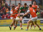 29 June 2019; Fionn McDonagh of Mayo in action against Jemar Hall, left, and Paul Hughes, 4, of Armagh during the GAA Football All-Ireland Senior Championship Round 3 match between Mayo and Armagh at Elverys MacHale Park in Castlebar, Mayo. Photo by Ben McShane/Sportsfile